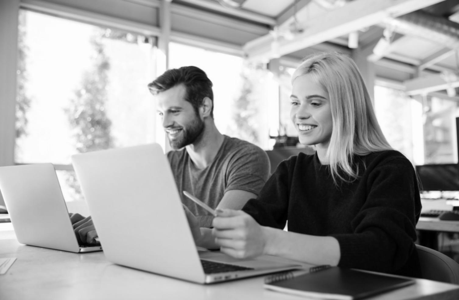 Students collaborating on natural language processing code during workshop session